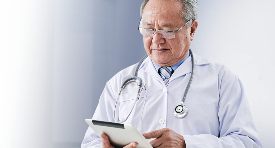 Physician consulting a chart